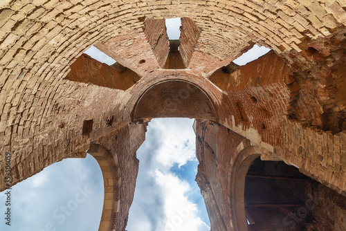 Novi Becej, Serbia - May 25, 2020: Arača (Hungarian: Aracs) is a medieval Romanesque church ruin located about 12 km of Novi Bečej, Serbia. It was built around 1230 during of the Kingdom of Hungary. photo