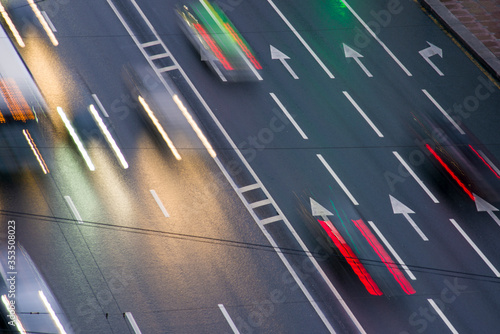 Road markings with blurred car lights