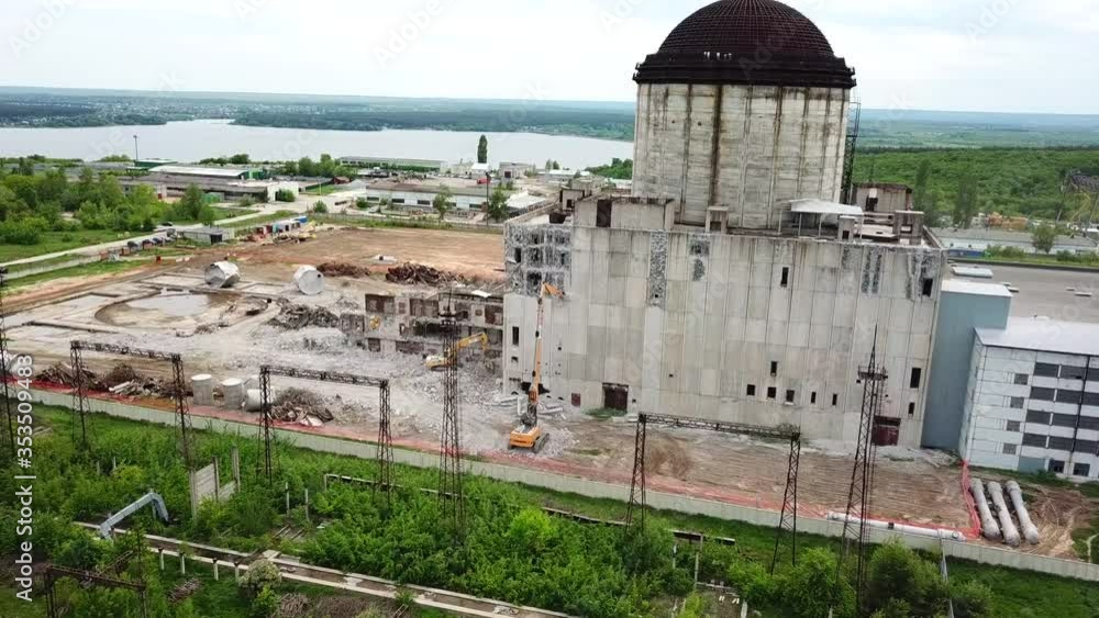 Aerial view of demolition site. Process of demolition of old industrial building Aerial view of demolition site. Process of demolition of old industrial building