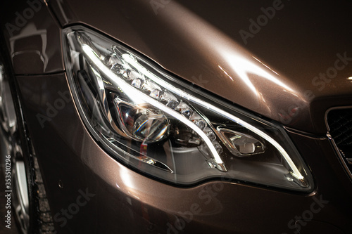 car headlight detail © Oleg