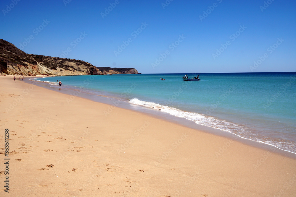 almost empty beach in Luz at the Algarve coast