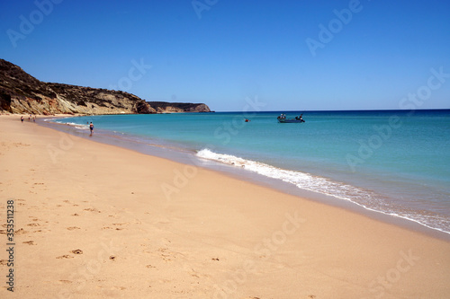 Fototapeta Naklejka Na Ścianę i Meble -  almost empty beach in Luz at the Algarve coast