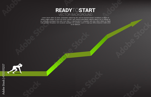 Silhouette of businesswoman ready to run from start line on growing graph. Concept of people ready to start career and business