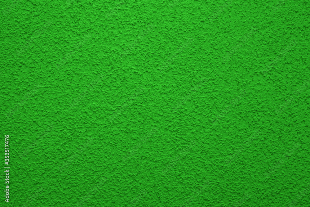Bright, colorful concrete wall texture, painted background - green color. Wallpaper plaster. Bright, colorful concrete wall texture, painted background - green color. Wallpaper plaster.