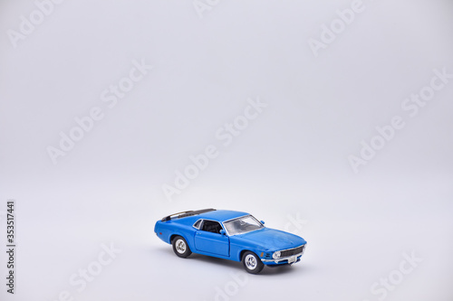 blue toy car on white background