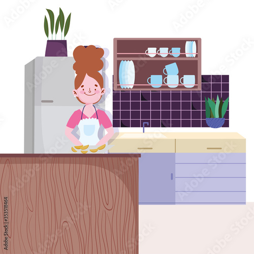 people cooking, girl with food on board cutting in the kitchen