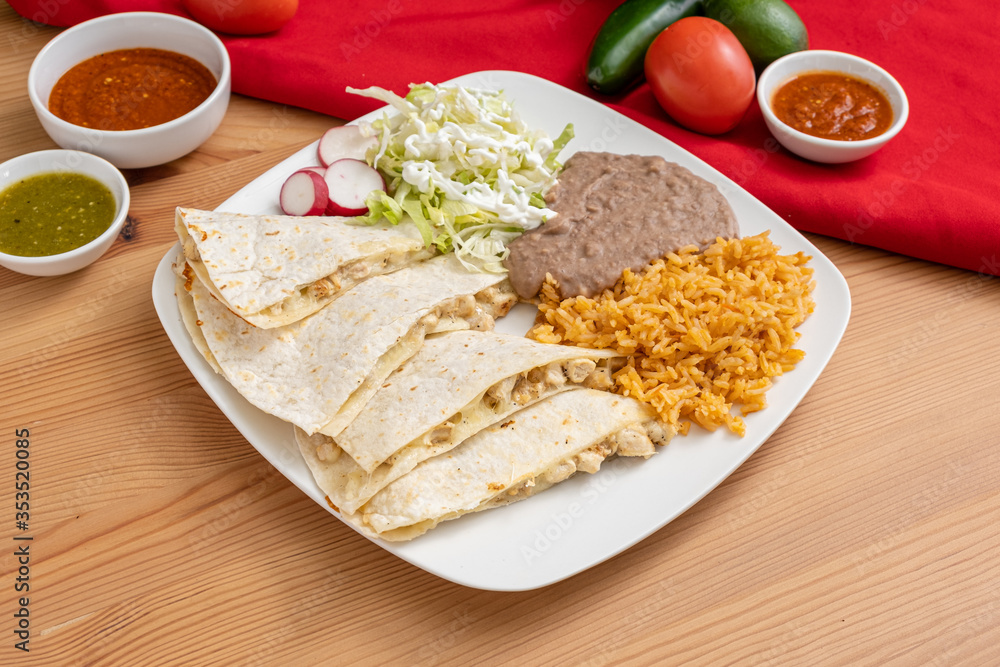 Cheesy chicken quesadilla made with a cheese blend, grilled chicken and