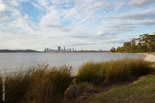 Golden sunrise over the Perth city center. A beautiful light catching the buildings as people start their day. 