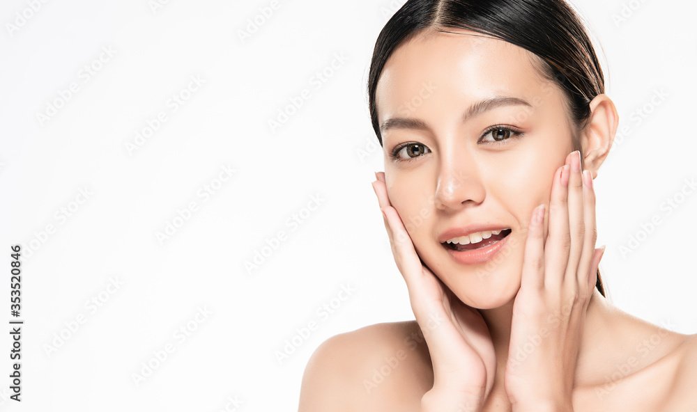 Beautiful Young  Asian Woman touching her clean face with fresh Healthy Skin, isolated on white background, Beauty Cosmetics and Facial treatment Concept