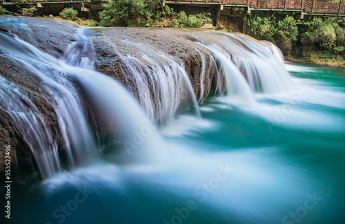 Fototapeta Naklejka Na Ścianę i Meble -  Waterfall in Xiaoqikong Scenic Area, Libo County, Southeast Guizhou, China