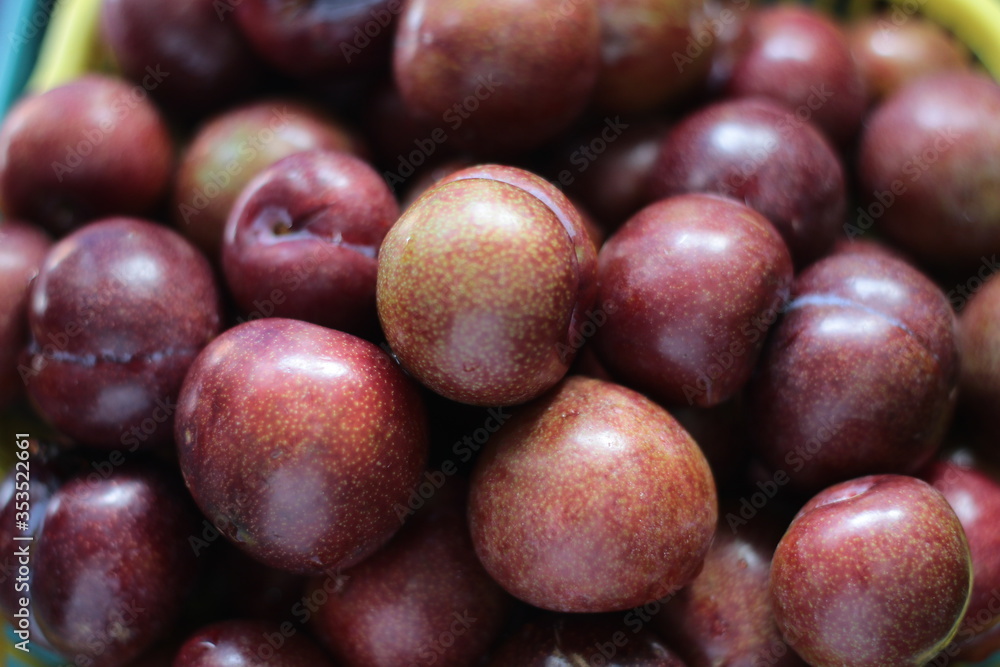 Fototapeta premium red Plum on a market