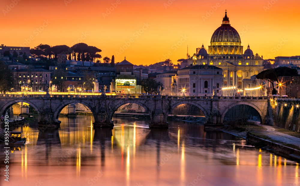 Saint Peter Cathedral and Tiber river at sunset.