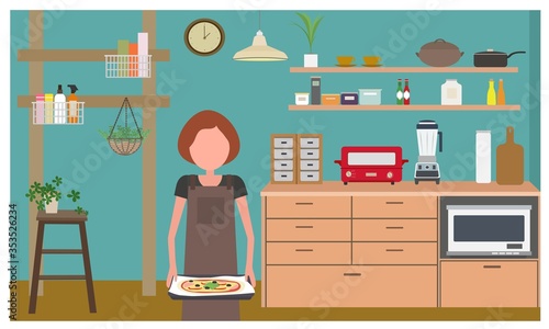 暮らし・ピザを作っている女性