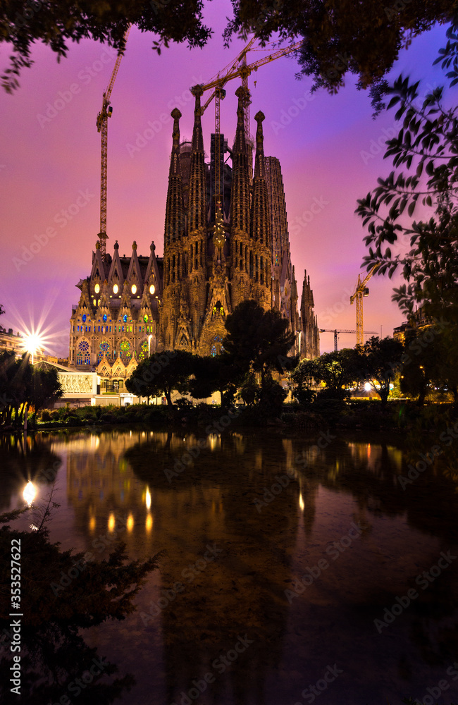 Sagrada Familia church at twilight in a rainy day. Barcelona, Spain.
