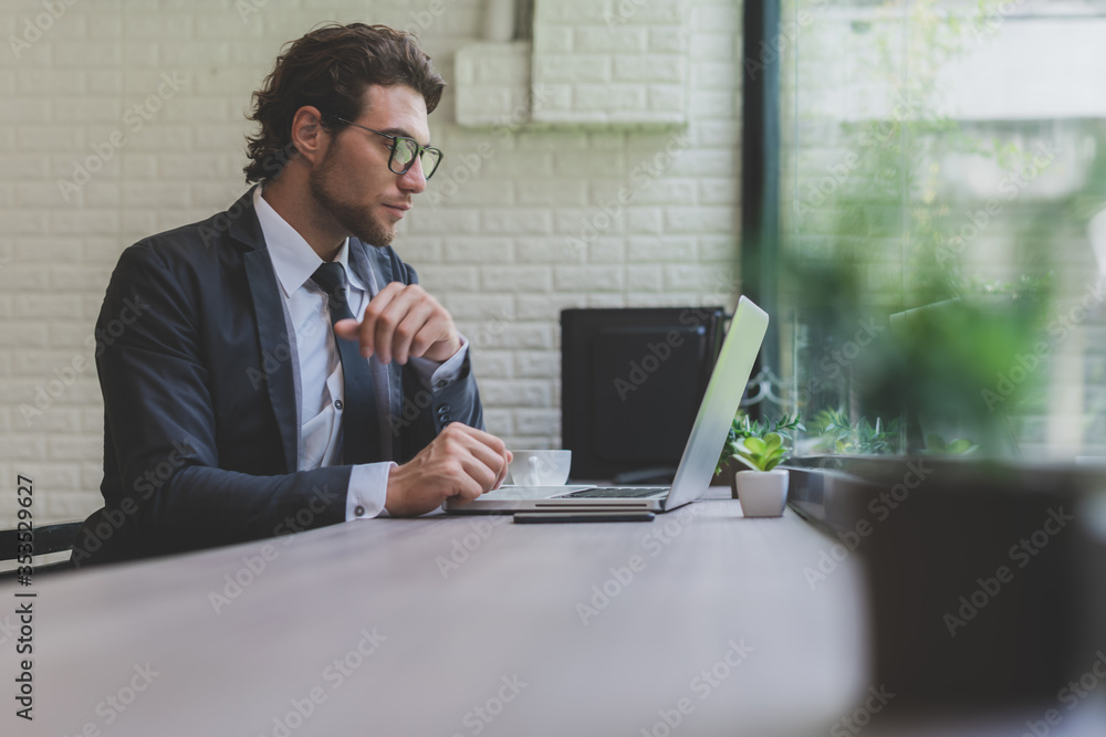 Business caucasian men working from home. Handsome man work in modern office. Concept of business, technology and meeting online. Business caucasian men working from home. Handsome man work in modern office. Concept of business, technology and meeting online.
