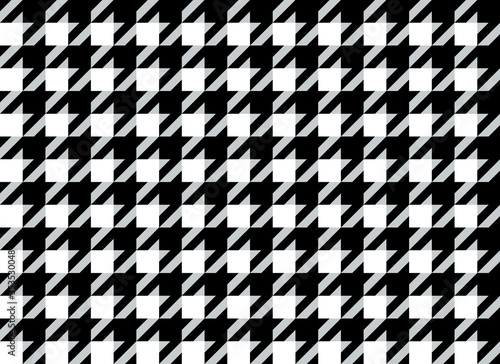 Classic elegant houndstooth textile pattern in black and white. Vector seamless traditional hounds tooth check pattern.