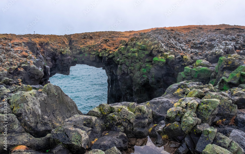 Stonebridge a volcanic stone arch at Arnarstapi, West Iceland