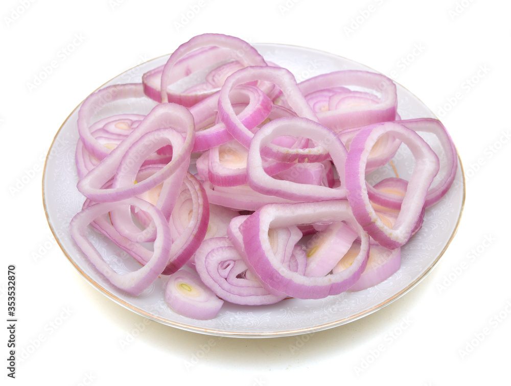 Sliced red onion in plate on white background