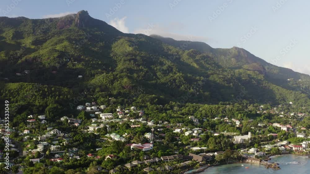 Aerial zoom out of Beau Vallon beach at Mahe island at Seychelles, during morning time Aerial zoom out of Beau Vallon beach at Mahe island at Seychelles, during morning time