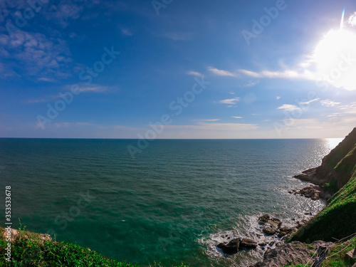 wonderful landscape Idyllic Scene Beach and rock on sky background.