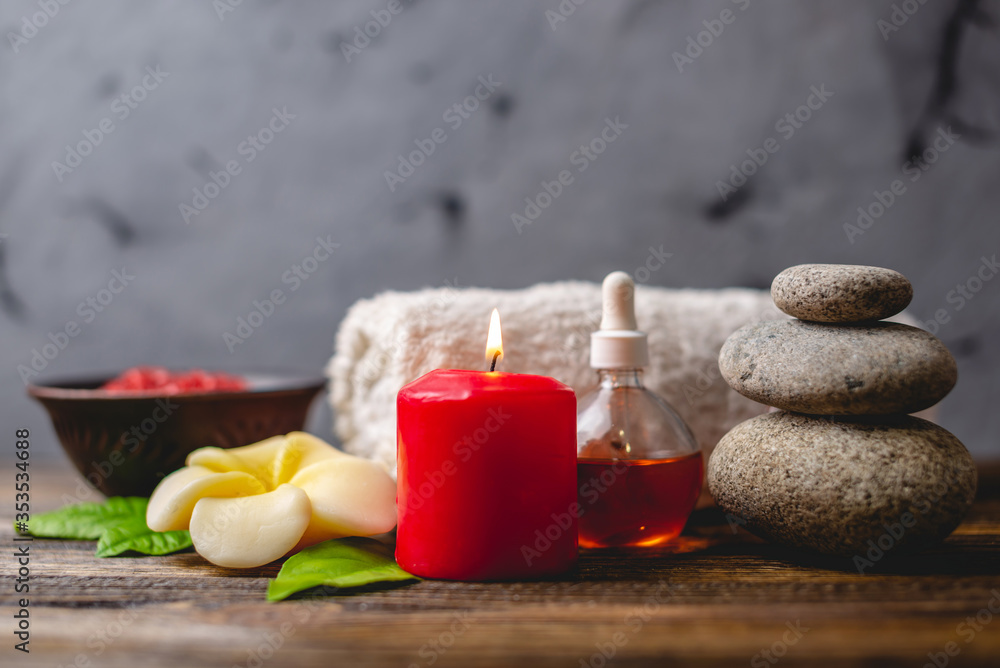 A set of accessories and tools for a relaxing Spa procedure in the salon or at home. Gentle body skin care. Wooden and grey background. The view from the top A set of accessories and tools for a relaxing Spa procedure in the salon or at home. Gentle body skin care. Wooden and grey background. The view from the top