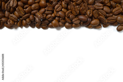 Texture of coffee beans. Roasted coffee beans background. close up Coffee beans with copy space on White background