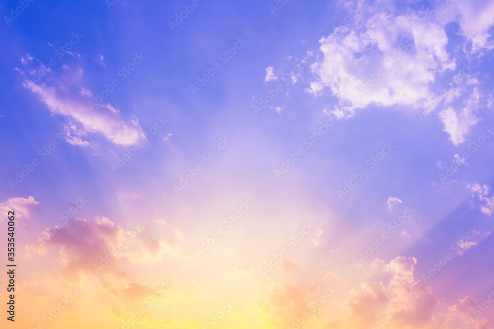 sky and clouds nature background,purple blue sky with sun beam light and yellow color sky and clouds nature background,purple blue sky with sun beam light and yellow color