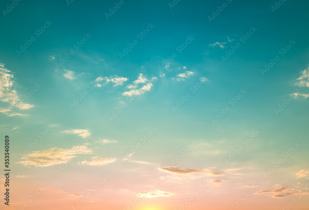 blue green sky with sunset light and few clouds blue green sky with sunset light and few clouds