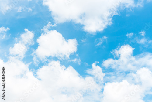sky and clouds nature background bright fluffy cloudy in light blue sky