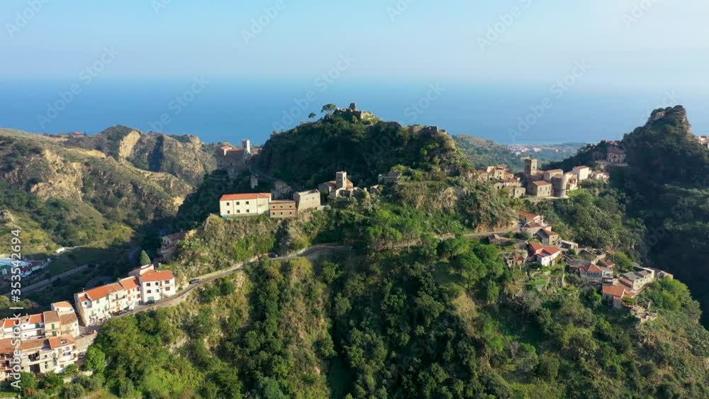 Aerial view of Savoca village in Sicily, Italy. Sicilian village Savoca (known from the Godfather movies). Houses on a hill in Savoca, small town on Sicily in Italy.