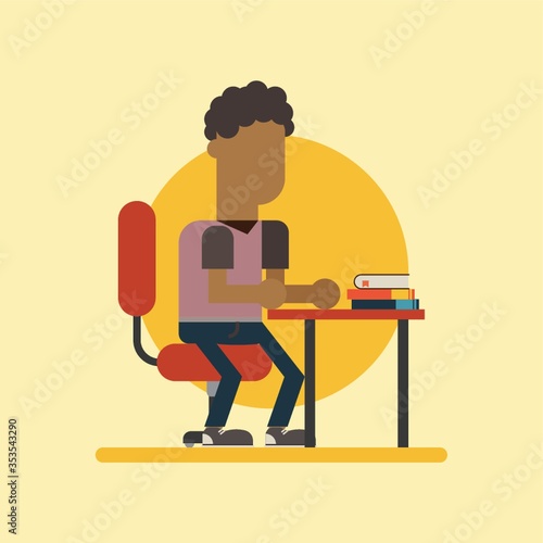 Boy sitting at his study desk