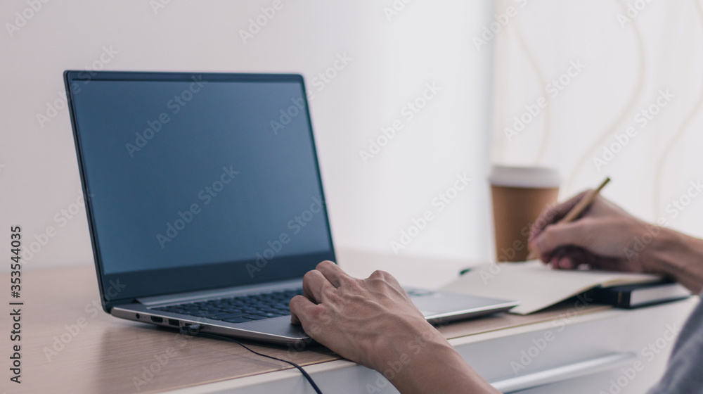 Businessman working or using laptop or computer for e-business at home. Student reading, learning & studying online webinar course or classroom via internet connection network. Business and Education Businessman working or using laptop or computer for e-business at home. Student reading, learning & studying online webinar course or classroom via internet connection network. Business and Education