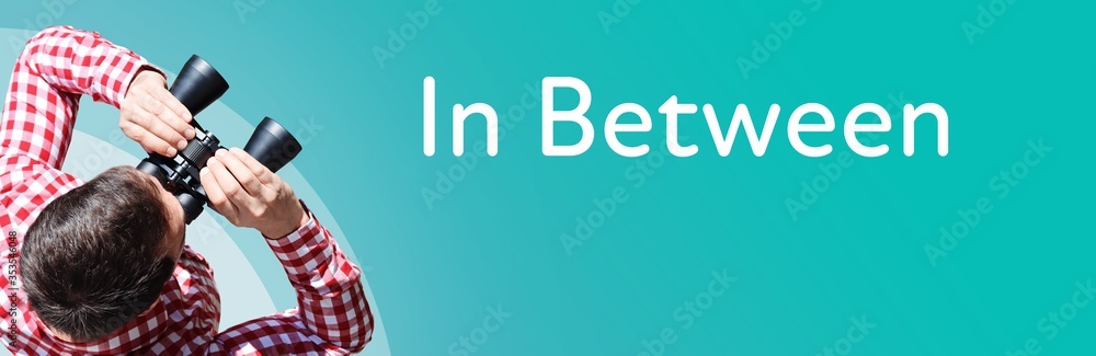 Fototapeta premium In Between. Businessman (man) looks through binoculars. Birds eye view. Focus on text. Blue Background. Business, Finance, Statistics, Analysis, Economy