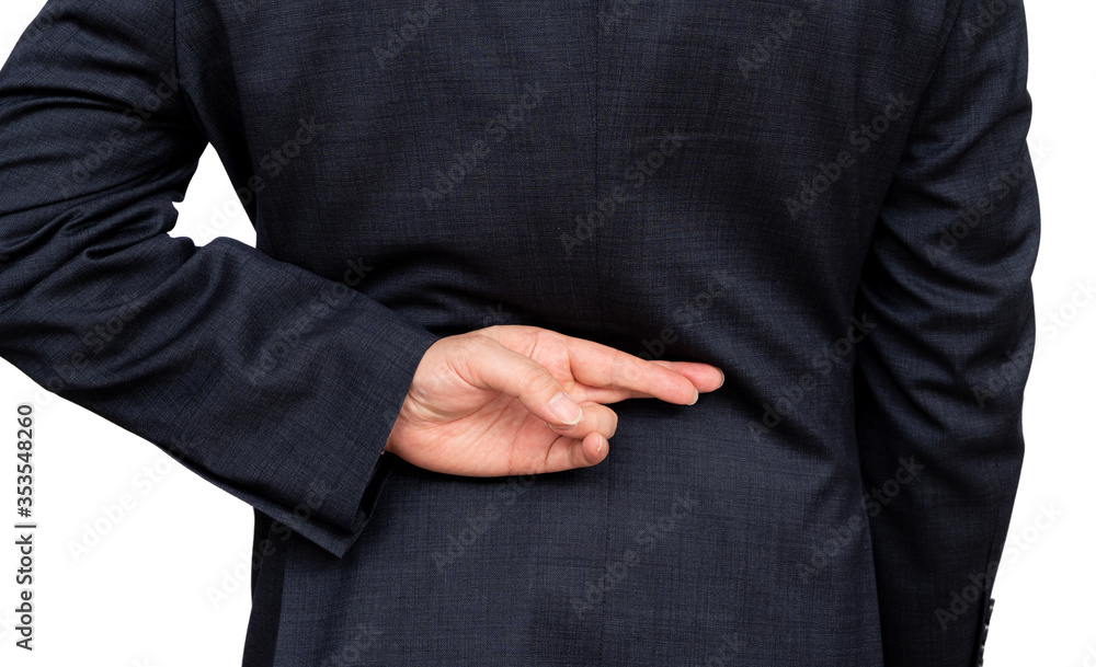 Obraz premium Dishonest businessman telling lies, lying male entrepreneur holding fingers crossed behind his back.