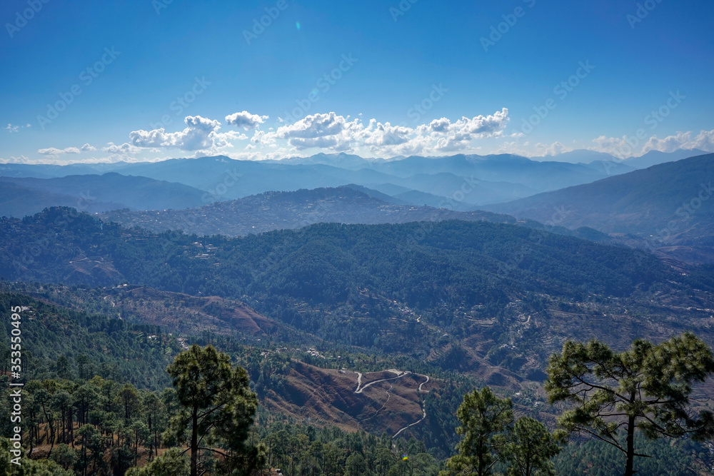 Landscape of a mountain range clicked from a height, layers of mountains.