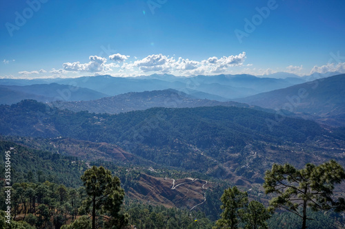 Landscape of a mountain range clicked from a height, layers of mountains.