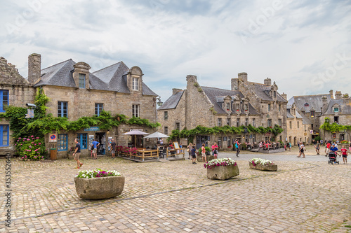 Locronan, France. Beautiful medieval buildings on Eglise Square photo