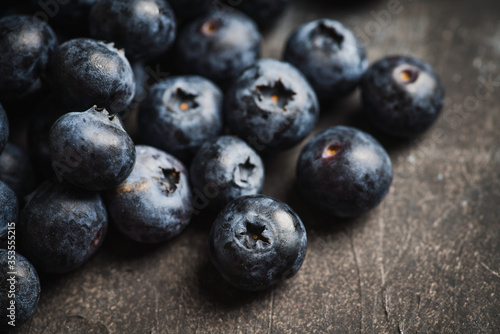Freshly harvested blueberries. Selective focus. Shallow depth of field.