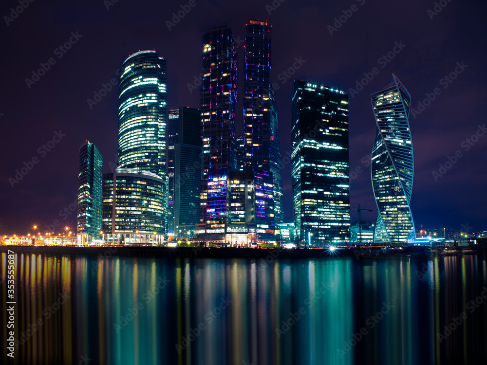 MOSCOW, RUSSIA - APRIL 21, 2018: Night view of the Moscow International Business Center, also referred to as Moscow City is a commercial district in central Moscow, Russia. MOSCOW, RUSSIA - APRIL 21, 2018: Night view of the Moscow International Business Center, also referred to as Moscow City is a commercial district in central Moscow, Russia.