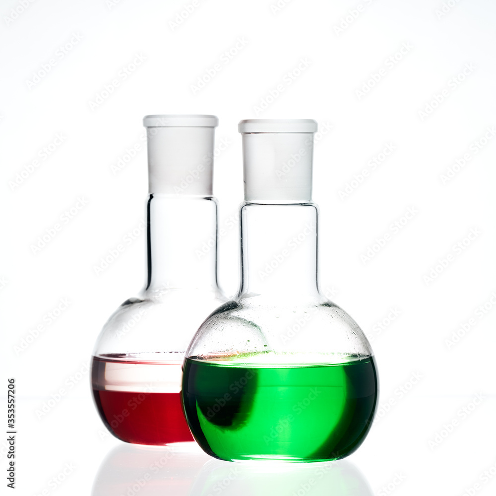 Glass flask with a chemical reagent. Glass flask with a chemical reagent.