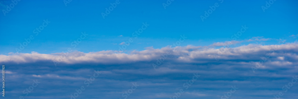 Clouds on a background of blue sky.