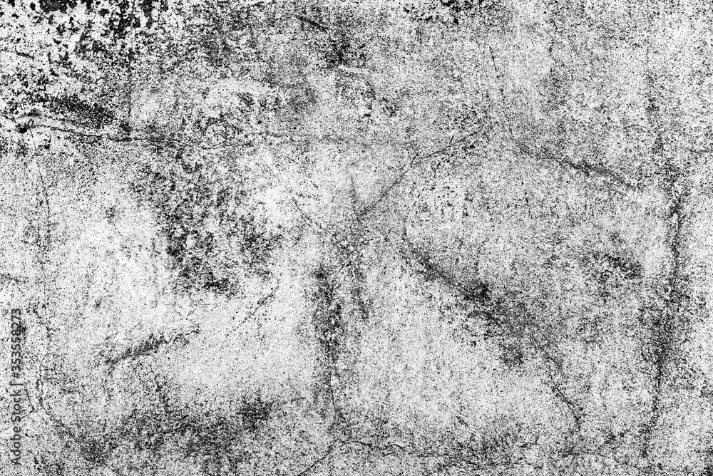 Fototapeta premium Texture of a concrete wall with cracks and scratches which can be used as a background