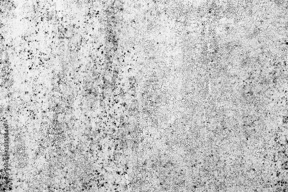 Metal texture with scratches and cracks which can be used as a background Metal texture with scratches and cracks which can be used as a background