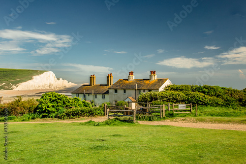 View of Poppy Cottage Seven Sisters and white cliffs of Birling Gap and Seven Sisters at East Sussex photo