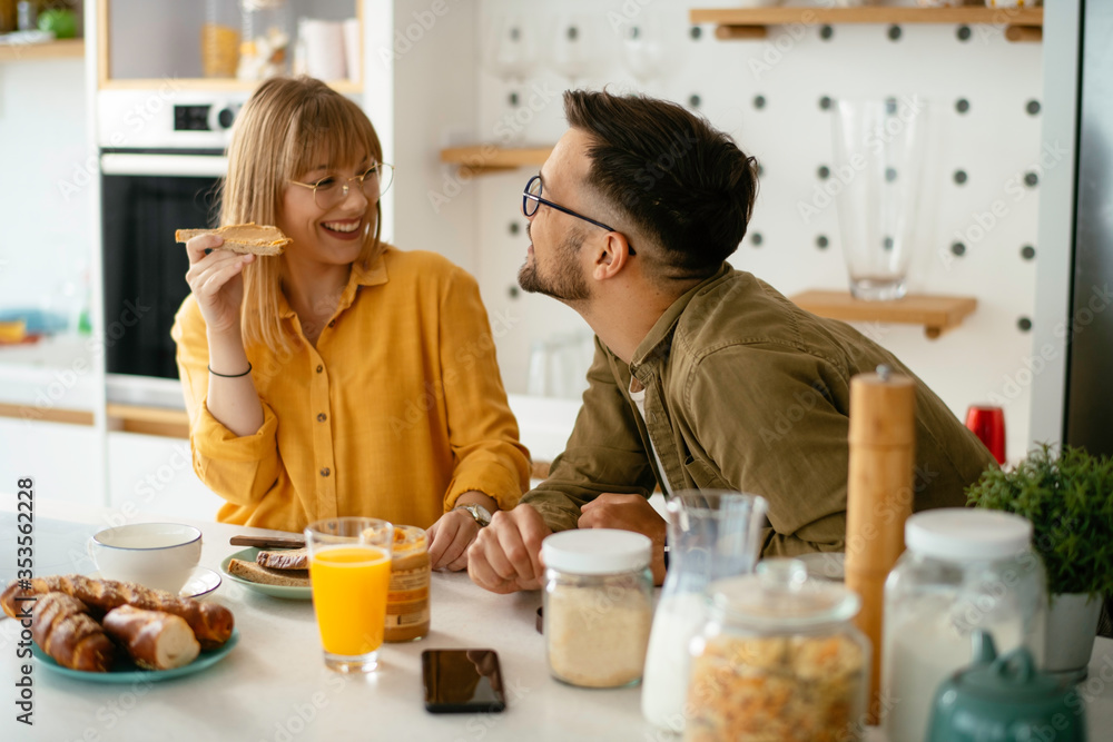 Young couple making breakfast at home. Boyfriend and girlfriend enjoying in morning..
Young couple making breakfast at home. Boyfriend and girlfriend enjoying in morning..
