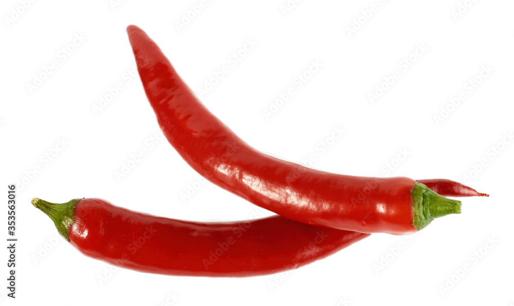 Two red chili peppers isolated on a white background. Clipping path.