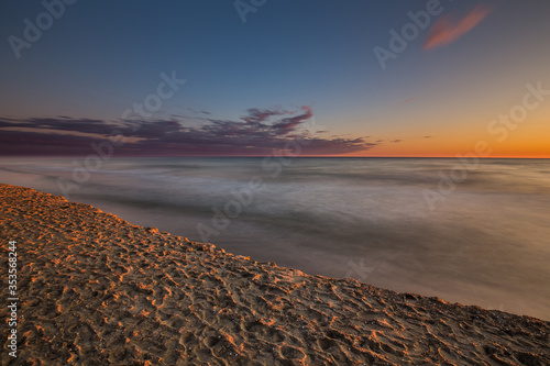 Travel photography of the Baltic sea coastline.Amazing sunrise over the Sea. Jastrzebia Gora, Poland. photo