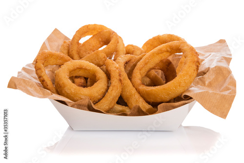 Takeaway box of fried onion rings isolated on white.