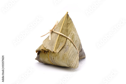 Sticky rice dumpling or Zongzi (Pyramid-shaped dumpling made by wrapping glutinious rice in bamboo leaves) for Chinese Boat dragon festival (5th Lunar month, Duanwu festival). Isolated on white photo