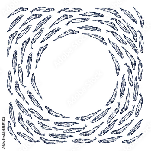 Black and white circular composition of smelt fish swimming around with round empty space in the centre - for typing, cover or package background